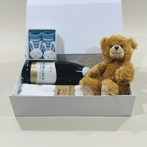 Baby Boy Gift Hamper image. Blue & White Teddy, Bunny Booties, Muslin Cotton Wrap, Chardonnay Pinot Noir. Buy online or Phone 03 5174 4888