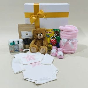 Baby Girl Hamper image. Pink/white teddy coral fleece pink blanket, bonnet, Socks, 3 baby care bottles, Nuby rattle. Online-Ph: 03 5174 4888