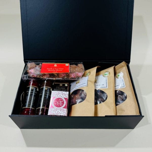 Chocolate Lovers Gift Hamper. choc nuts & raspberries, rocky road, choc cranberry pudding with chocolate sauce. Online or Ph: 03 5174 4888