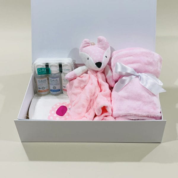 Girl Baby Hamper image. Pink Fleece Blanket Soft Pink Giraffe Comforter, 3 baby care travel bottles, Bandana Bibs. Online or Ph 03 5174 4888