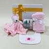 Girl Baby Hamper image. Pink Fleece Blanket Soft Pink Giraffe Comforter, 3 baby care travel bottles, Bandana Bibs. Online or Ph 03 5174 4888