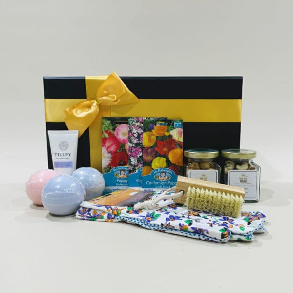 Gardeners Hamper image. Flowering seeds floral scented bath bombs, hand nail cream, tasty nibbles and more. Online or Phone: 03 5174 4888