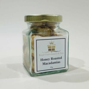 Honey Roasted Macadamias 95g image. Honey roasted macadamia nuts covered in a crunchy sweet honey coating. Buy Online or Phone: 03-5174-4888