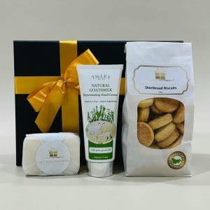 Gift Pack 12 Image. Goats Milk hand cream. A choice of Butter Shortbread, Raspberry & White Choc Biscuits, or Anzac Biscuits. 03-5174-4888.