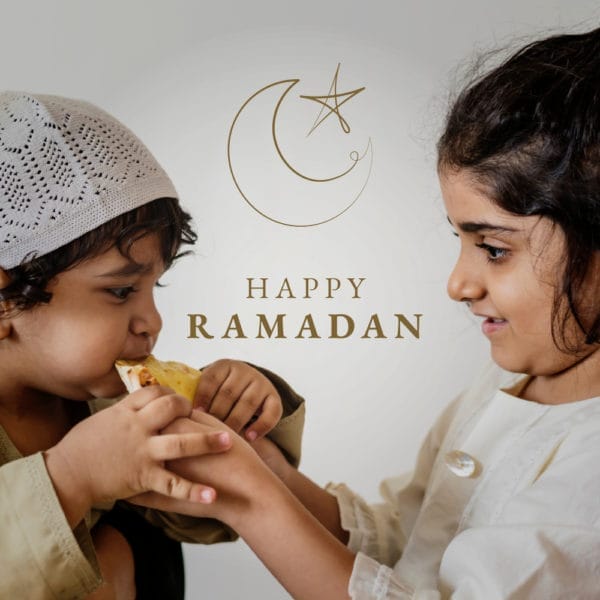 Two children happily eating bread with the text "Happy Ramadan" in the background.
