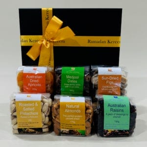 A Ramadan Survival Kit gift hamper featuring a gift box filled with a variety of nuts and dried fruits.